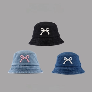 Set of three denim sun hats in black and blue with detailed bow embroidery