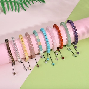 Set of ten assorted natural stone beaded bracelets with adjustable woven cord