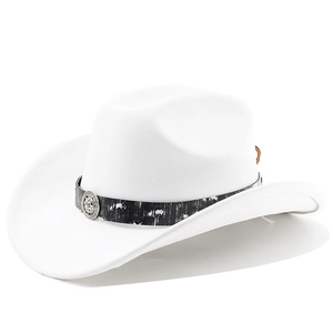Detail of white felt cowboy hat featuring black leather band and silver lion head buckle