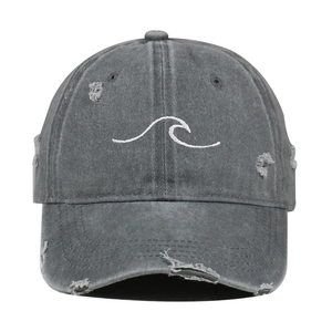 Distressed dark grey washed cotton baseball cap with white embroidered wave on front