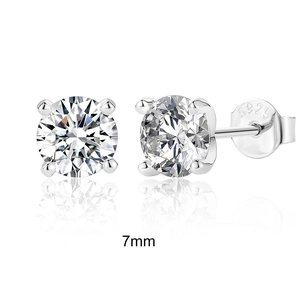 Macro shot of 7mm round cut moissanite studs in 925 silver with hallmark detail