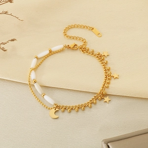 Elegant gold double-layer stainless steel bracelet with moon, star charms and white pearls