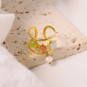 Gold stainless steel open ring with green, pink, blue gems and a white pearl pendant