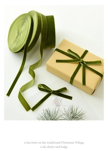 Olive green velvet ribbon set on gift box with pine needles for DIY Christmas decor