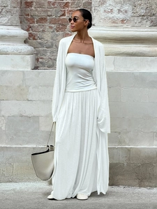 Three-piece white set with tube top, long cardigan, and pleated wide-leg trousers