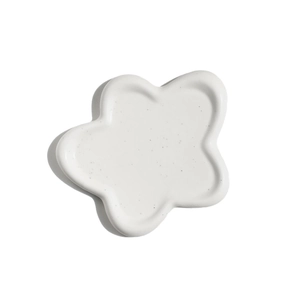 Minimalist white heart-shaped ceramic jewelry tray with sesame glaze dot pattern