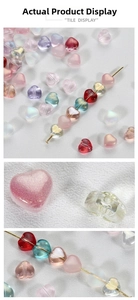 Vue macro de perles en forme de cœur colorées avec paillettes pour la création de bijoux
