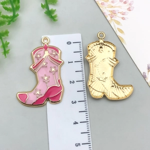 Pink western cowboy boot alloy pendant with star charm and golden textured back
