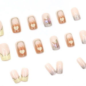 Sparkling Aurora diamond and heart press-on nails in French minimalist gradient style