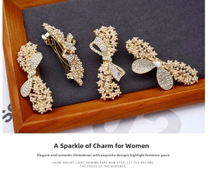 Detailed macro view of gold-tone hair clips with faux pearls and sparkling rhinestones