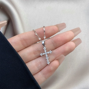 Classic silver plated cross pendant necklace with sparkling cubic zirconia on a chain