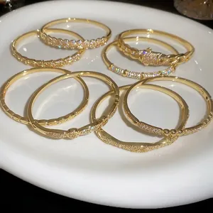 Luxurious gold plated bangle set with micro-paved zircons and retro French style design