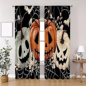 Detail view of Halloween velvet curtains with colorful pumpkins and spider webs