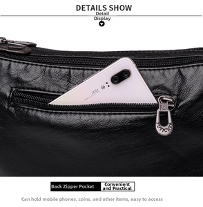 Gros plan du sac en cuir noir montrant une poche arrière zippée pratique pour smartphone