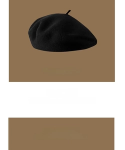 Close-up of premium black Australian wool beret showing soft textured wool fabric and shape