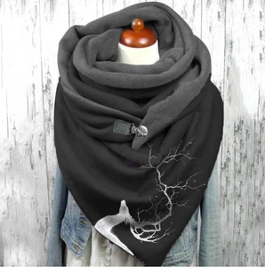 Thick warm black and grey reversible shawl with white branch patterns and button closure