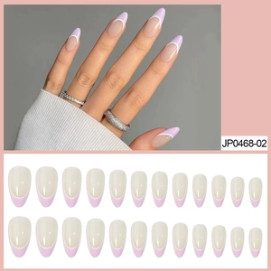 Long almond press-on nails in purple and white French tip style with glossy finish