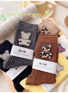 Detail of cotton crew socks with rhinestone bear patches in multiple neutral colors