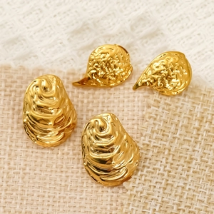 Irregular oval stainless steel earrings with textured gold finish and vintage style