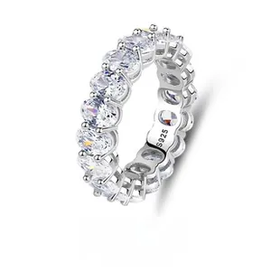 Detailed macro view of S925 sterling silver band ring with oval cut cubic zirconia stones