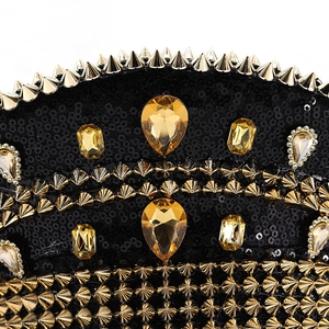 Sparkly black captain hat with gold studs and yellow gems for festive stage performances