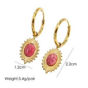 Detailed view of 14K gold maple leaf earrings with pink rhodochrosite and size labels