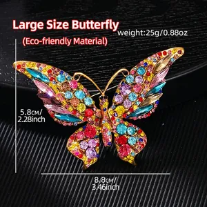 Detail of vintage butterfly brooch with multi-colored crystals and dimensions 8.8cm x 5.8cm