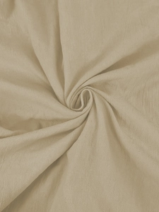 Detailed texture of khaki linen fabric showing natural wrinkles and soft drape on the shirt