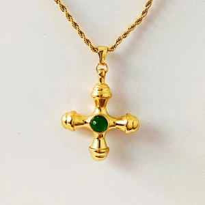 Vintage gold cross pendant necklace featuring a polished green tiger eye gemstone inlay