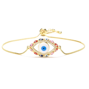 Detailed shot of gold-plated evil eye bracelet with colorful enamel and zircon crystals