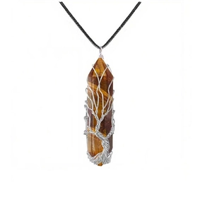 Detail of tiger eye crystal pendant featuring silver wire-wrapped tree of life design