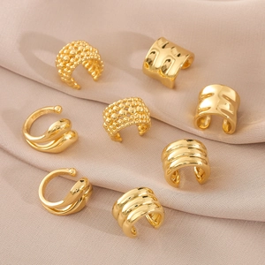 Set of 8 minimalist 18k gold plated ear cuffs in various textured and smooth designs