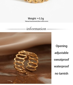 Detailed view of gold geometric wavy ring showing sweatproof and waterproof features