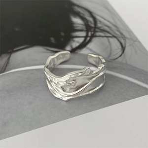 Minimalist 925 sterling silver open ring with unique liquid lava texture and irregular finish