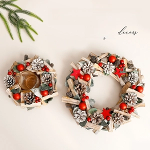Christmas decoration wreath and glass candle holder set with wood and pinecones