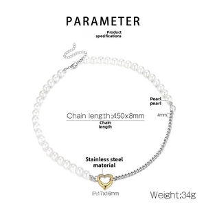 Detail showing shell pearl stitching with steel Cuban chain and golden heart pendant