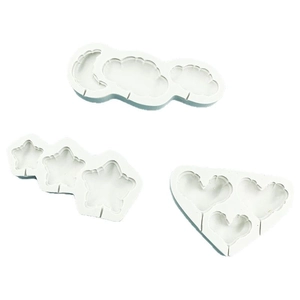 Silicone fondant molds with star, heart, and cloud shapes for birthday cake baking