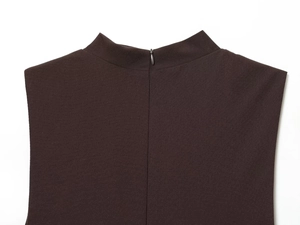 Detail of stand collar and invisible zipper on dark brown sleeveless top garment