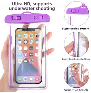 Macro detail of purple waterproof phone pouch showing secure sealing lock and screen sensitivity