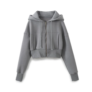 Detail of dark grey cropped hoodie with metal zipper, drawstring, and ribbed cuffs