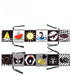 Double-sided black and white high-contrast crib book with animal and shape patterns