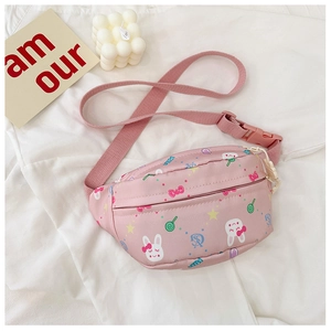 Detail of pink cartoon bunny chest bag showing waterproof fabric and adjustable buckle