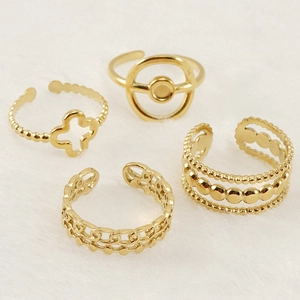 Set of four adjustable 18K gold plated stainless steel clover and geometric rings