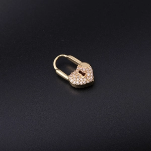 Creative double-sided heart lock hoop earring with zircon pavé in gold finish