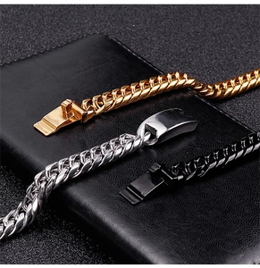 Detailed shot of classic Cuban link chains in gold, silver, and black metal finishes