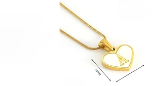 Close-up of 18K gold plated stainless steel heart pendant with letter A on snake chain