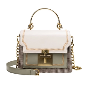 Fashionable color-block small square bag with gold metal handle and chain strap