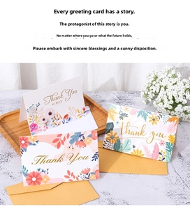 Floral Thank You greeting cards with kraft envelopes on a wooden tray with flowers