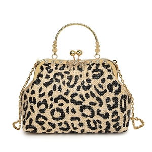 Colorful woven straw evening handbag with leopard pattern and gold ring handle