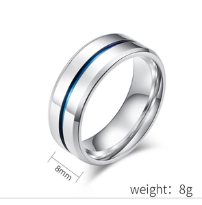 Detailed macro view showing the 8mm width and 8g weight of this blue groove metal ring